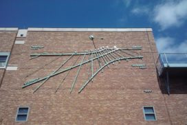 image of sundial on building at University of Washington - Gregory Olson